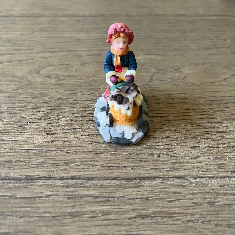 O’Well’s Christmas Village Accessory - Girl Pushing Dogs